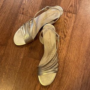 Strappy gold leather sandal.